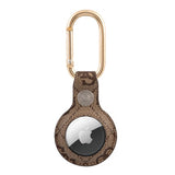Guess AirTag Holder Vintage Script Brun